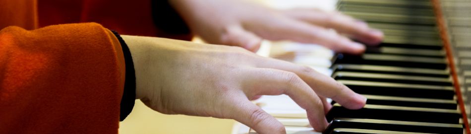 Student Learning to play the piano