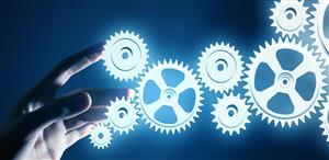 Gears and a hand on blue background 