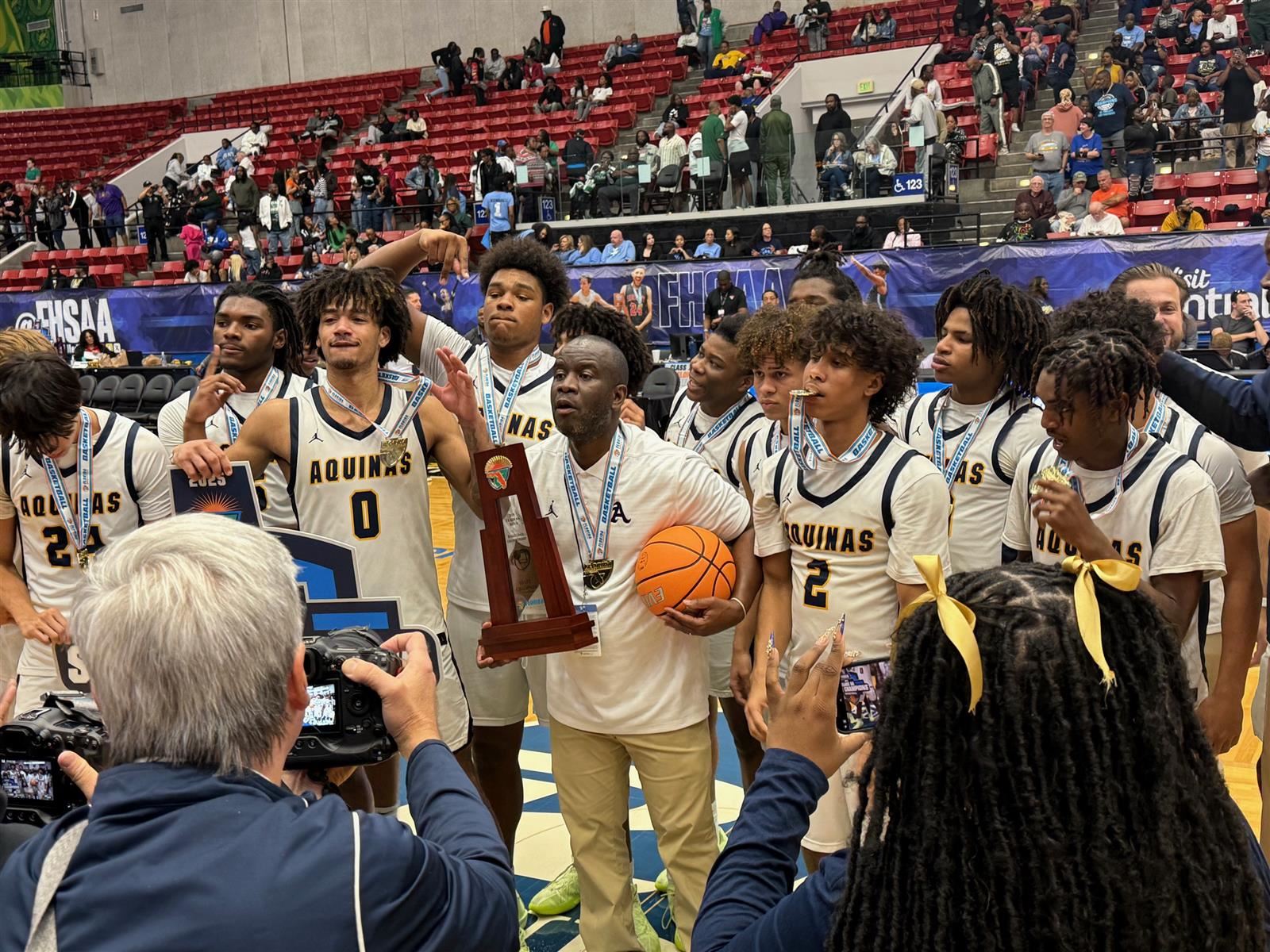 St. Thomas Aquinas hoops defeat Orlando Evans 71-63 for Class 6A title