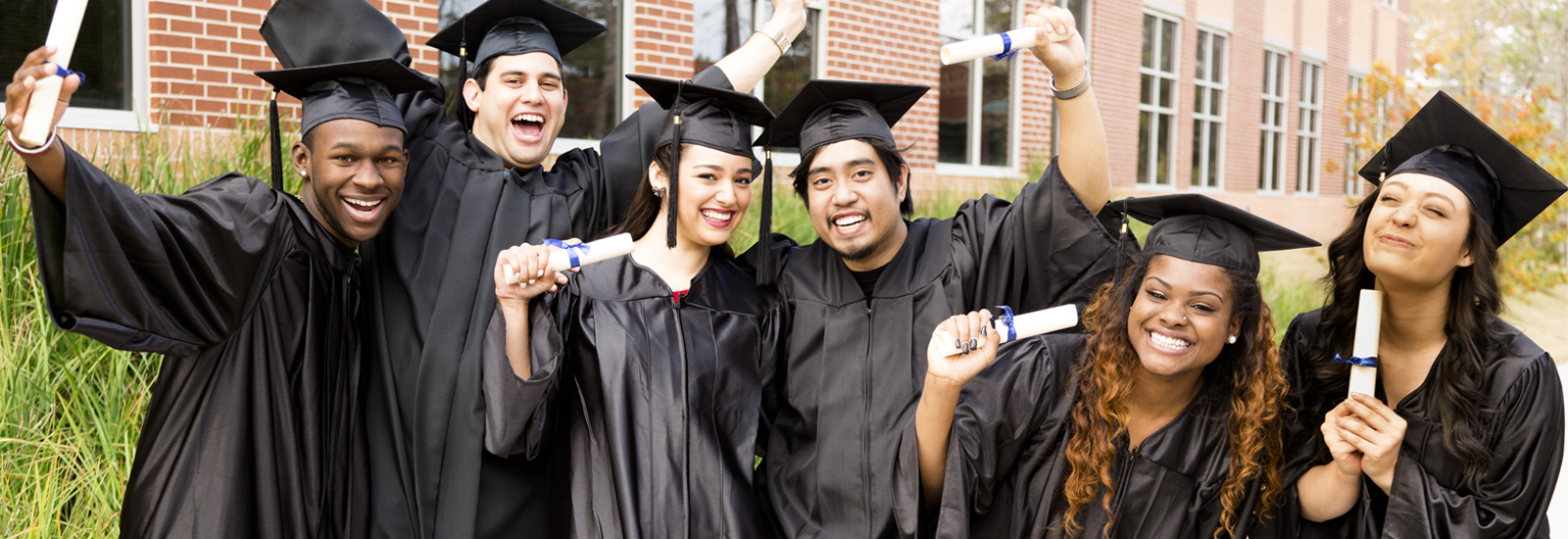Students holding diploma