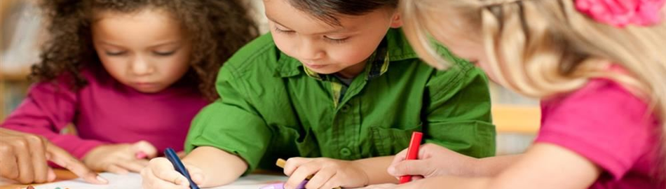 Picture of students coloring in an Early Childhood classroom Picture of students coloring in an Early Childhood classroom
