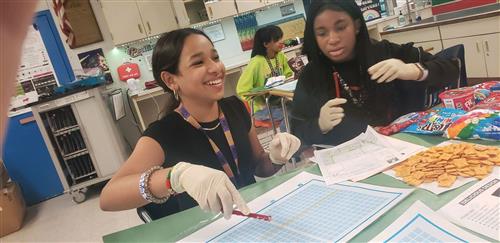 yearbook students practicing page layout