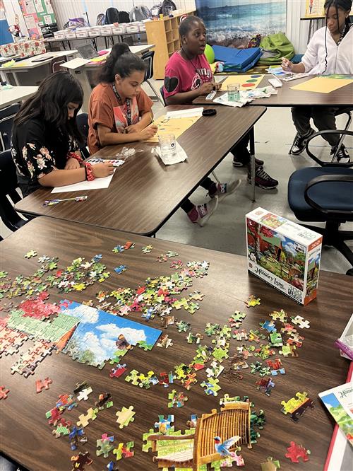 students working on puzzles