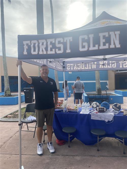 Coach dorfman and athletics table