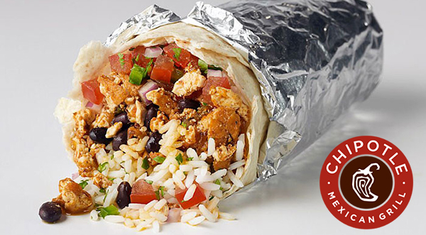 Burrito wrapped in foil with Chipotle Mexican Grill with pepper