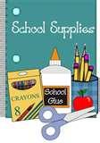 school supplies in front of green  paper