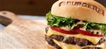 Picture of hamburger with cheese and BurgerFi on the bun