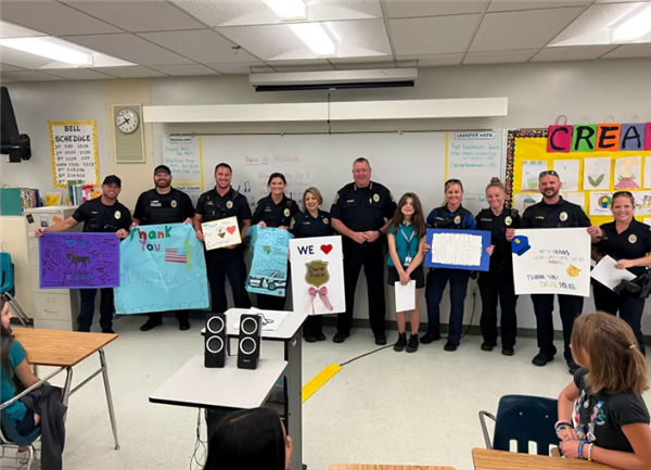 Davie PD visiting Creative Arts class